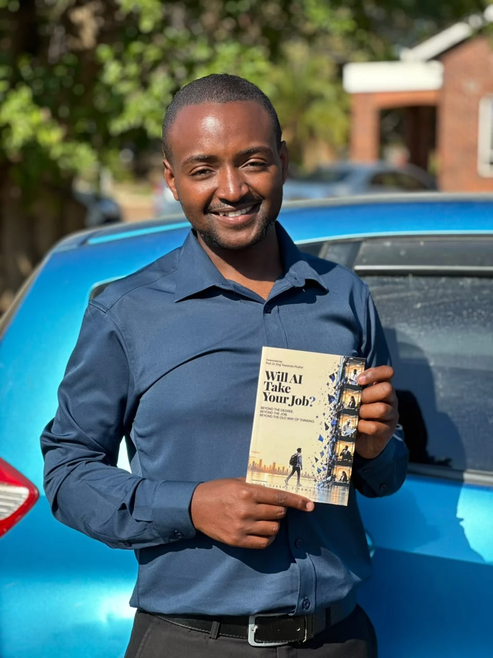 A reader holding his copy of the book